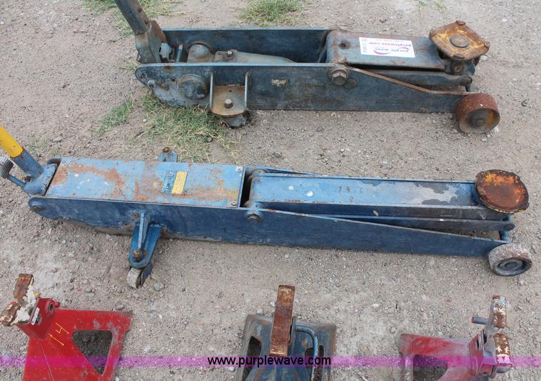 image for item C2832 Two floor jacks and three jack stands