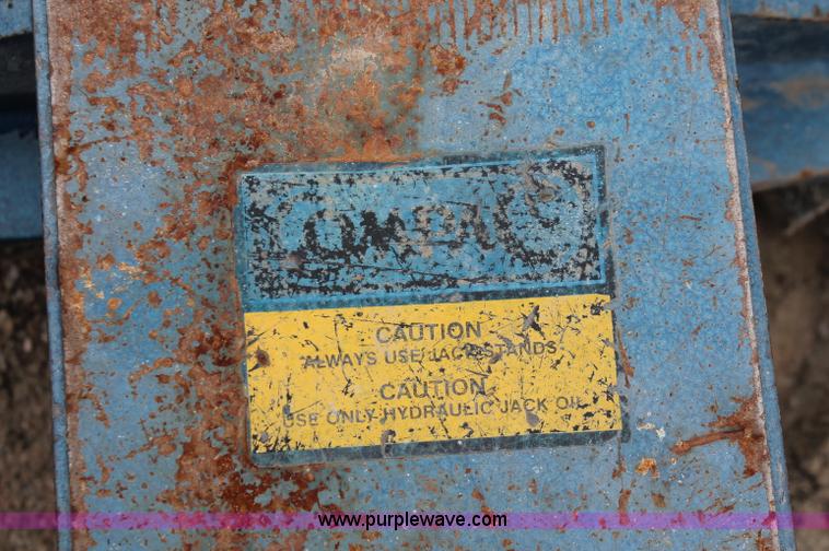 image for item C2832 Two floor jacks and three jack stands