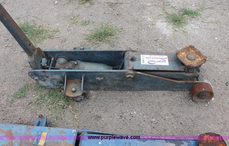 image for item C2832 Two floor jacks and three jack stands