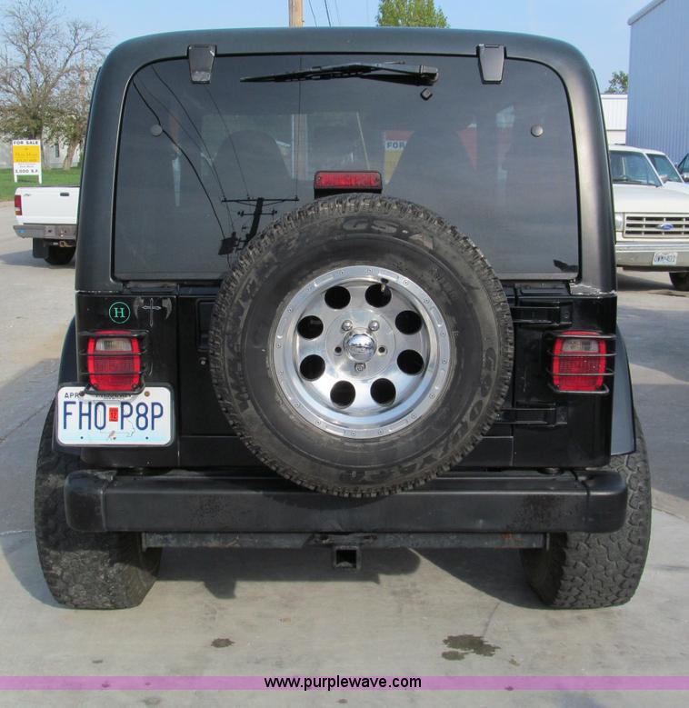 image for item E2183 2000 Jeep Wrangler Sahara SUV