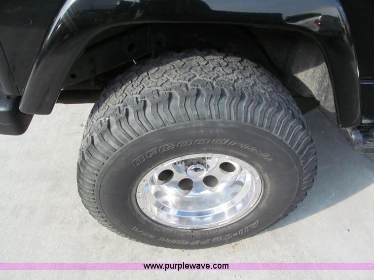 image for item E2183 2000 Jeep Wrangler Sahara SUV