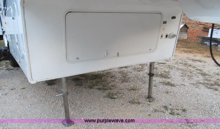 image for item F4582 2011 Coachman 310RLTS fifth wheel camper