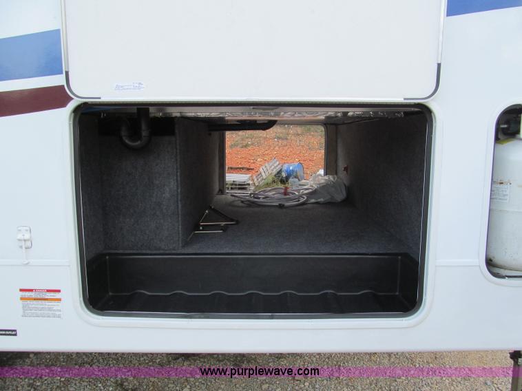 image for item F4582 2011 Coachman 310RLTS fifth wheel camper