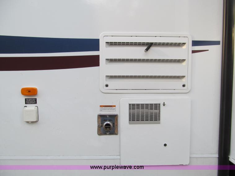 image for item F4582 2011 Coachman 310RLTS fifth wheel camper