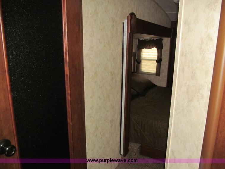 image for item F4582 2011 Coachman 310RLTS fifth wheel camper