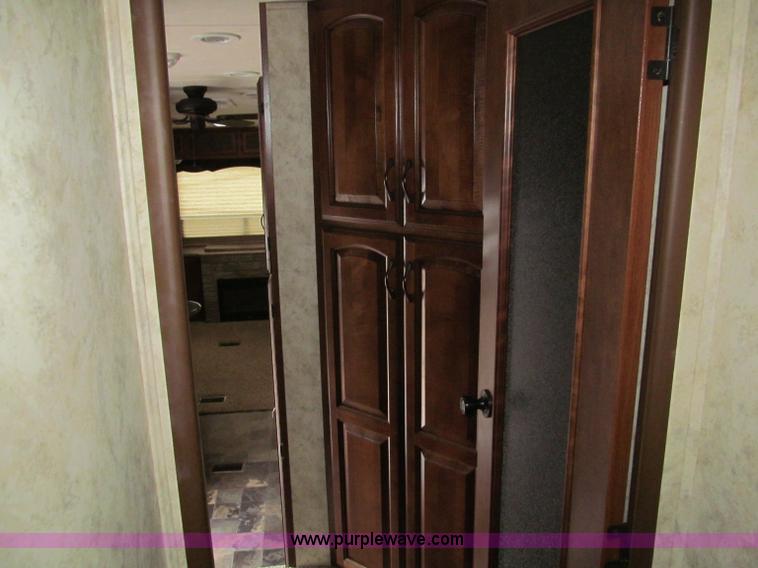 image for item F4582 2011 Coachman 310RLTS fifth wheel camper