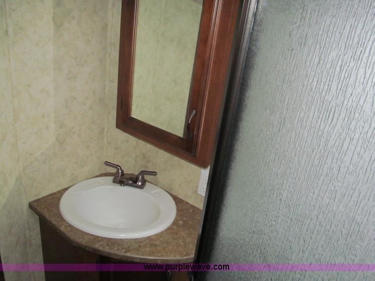 image for item F4582 2011 Coachman 310RLTS fifth wheel camper