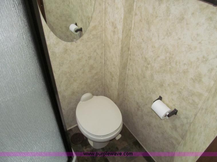 image for item F4582 2011 Coachman 310RLTS fifth wheel camper