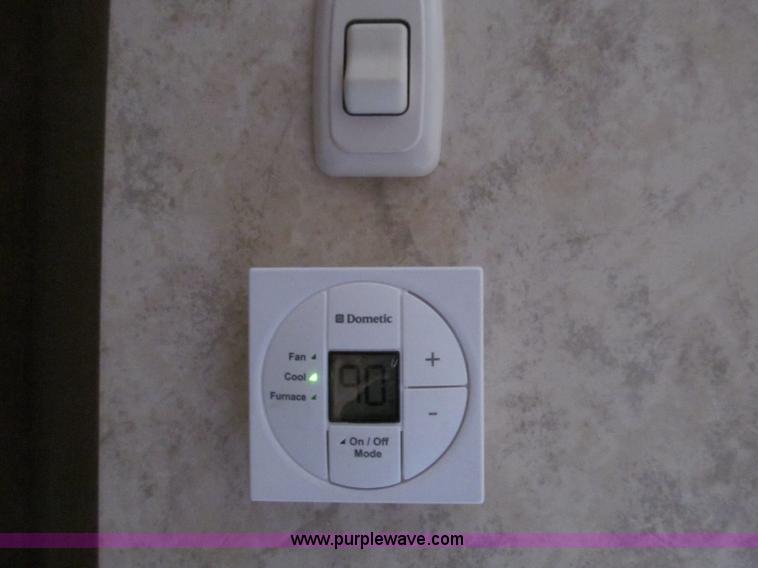 image for item F4582 2011 Coachman 310RLTS fifth wheel camper