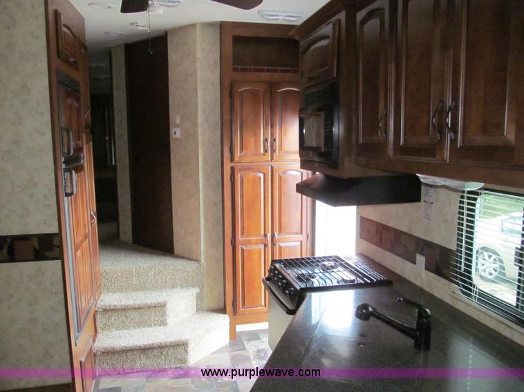 image for item F4582 2011 Coachman 310RLTS fifth wheel camper