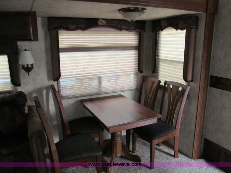 image for item F4582 2011 Coachman 310RLTS fifth wheel camper
