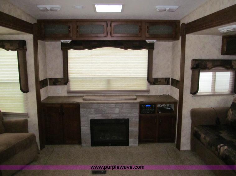 image for item F4582 2011 Coachman 310RLTS fifth wheel camper