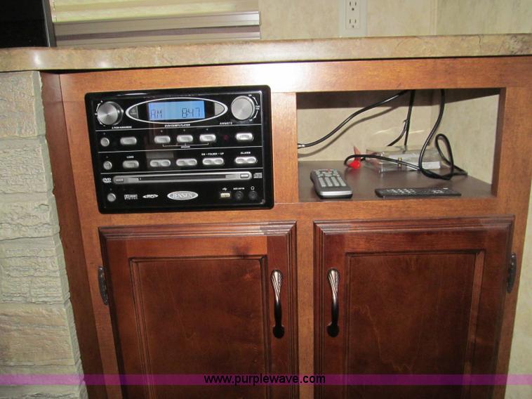 image for item F4582 2011 Coachman 310RLTS fifth wheel camper