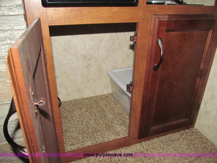 image for item F4582 2011 Coachman 310RLTS fifth wheel camper