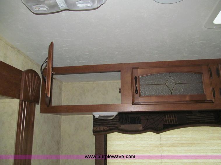 image for item F4582 2011 Coachman 310RLTS fifth wheel camper