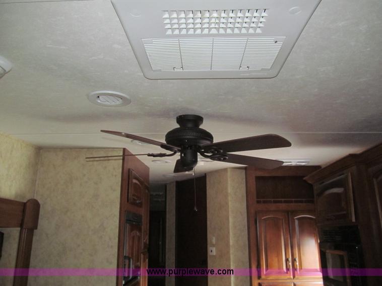 image for item F4582 2011 Coachman 310RLTS fifth wheel camper