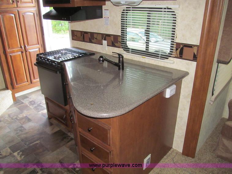 image for item F4582 2011 Coachman 310RLTS fifth wheel camper