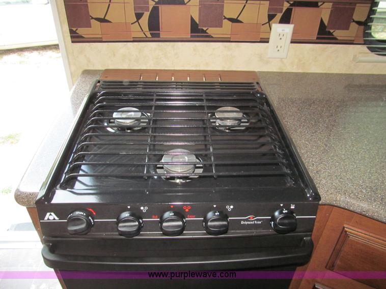 image for item F4582 2011 Coachman 310RLTS fifth wheel camper