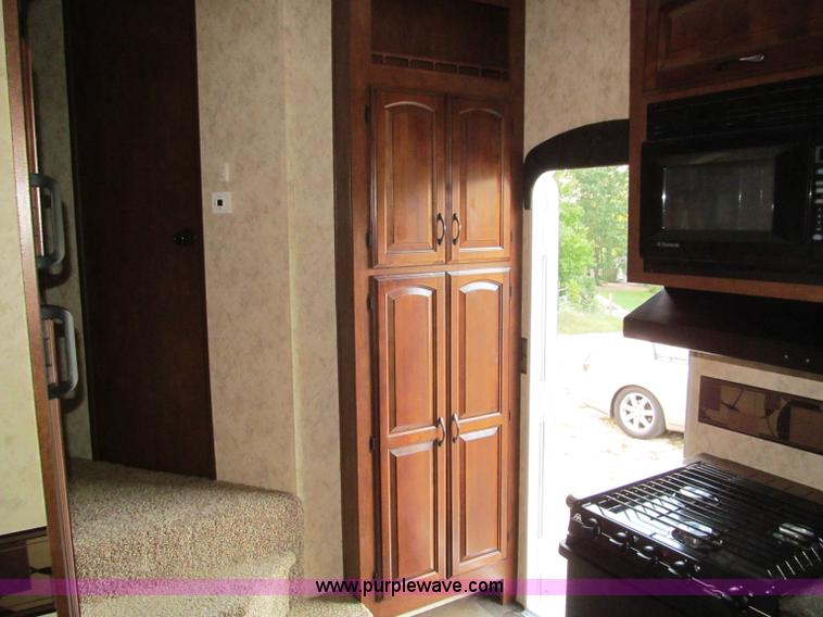 image for item F4582 2011 Coachman 310RLTS fifth wheel camper