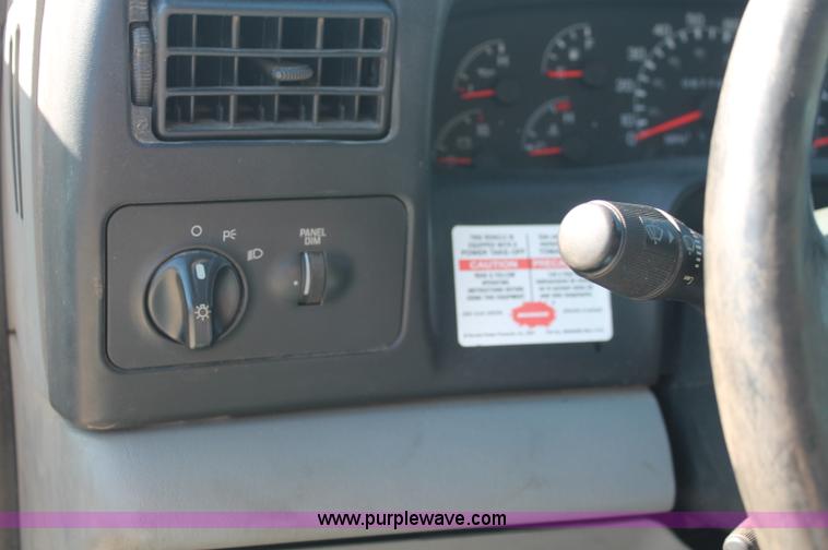 image for item C2905 2005 Ford F650 flatbed dump truck