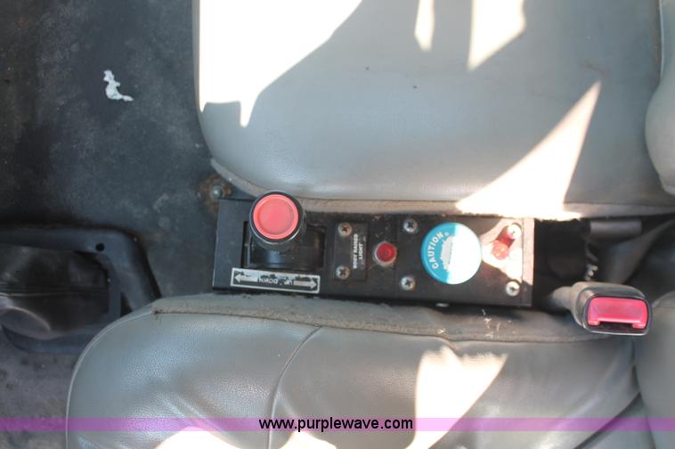 image for item C2905 2005 Ford F650 flatbed dump truck