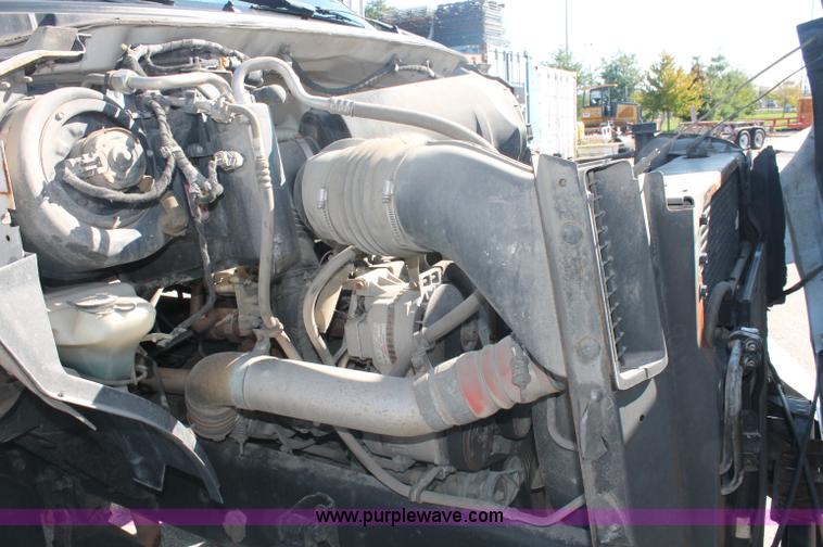 image for item C2905 2005 Ford F650 flatbed dump truck