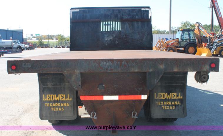 image for item C2905 2005 Ford F650 flatbed dump truck