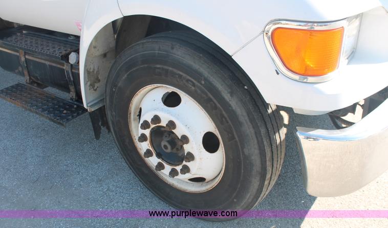 image for item C2905 2005 Ford F650 flatbed dump truck