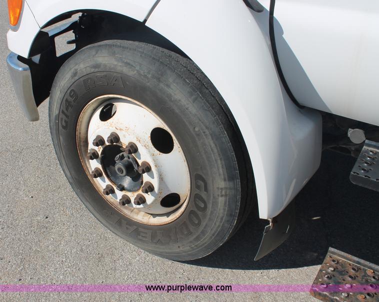 image for item C2905 2005 Ford F650 flatbed dump truck