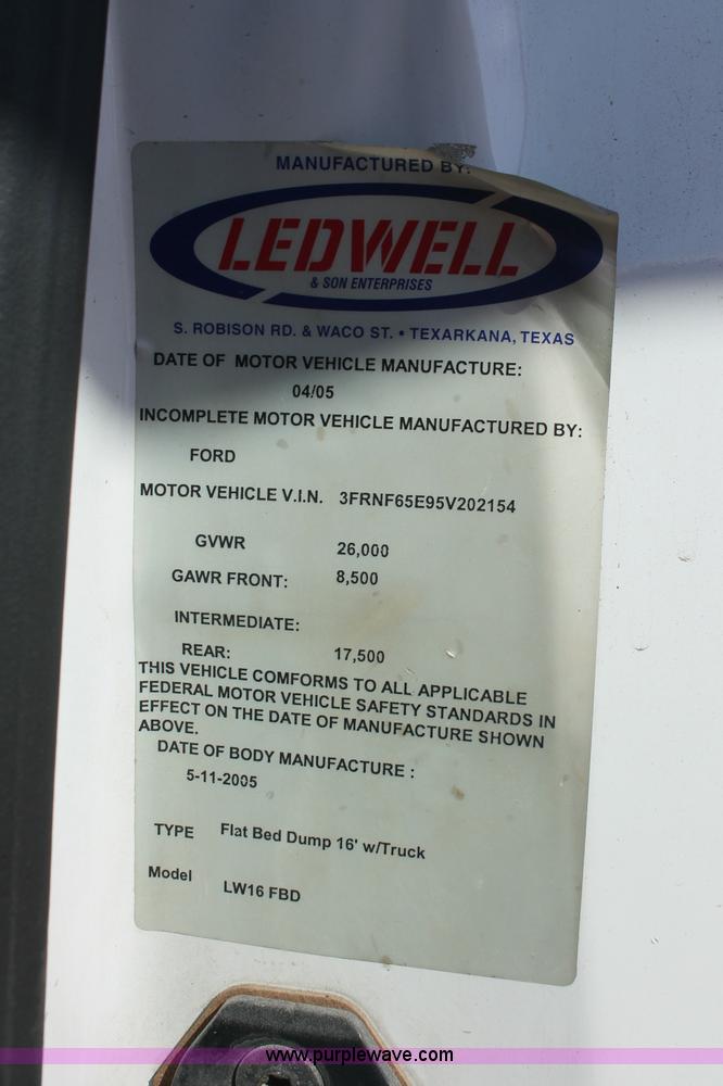 image for item C2905 2005 Ford F650 flatbed dump truck