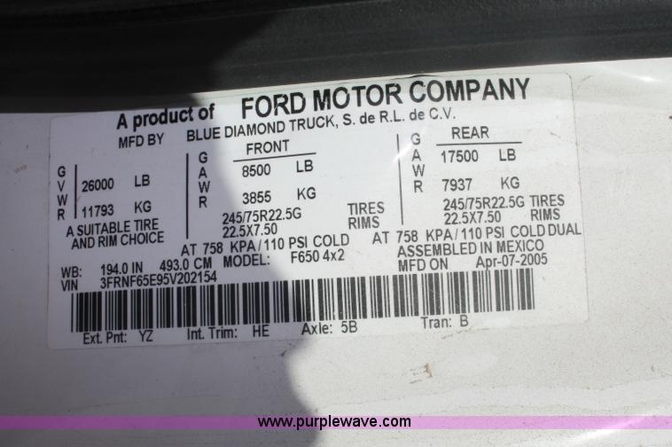 image for item C2905 2005 Ford F650 flatbed dump truck