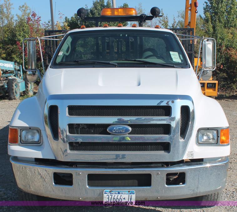 image for item C2911 2007 Ford F650 flatbed rollback truck