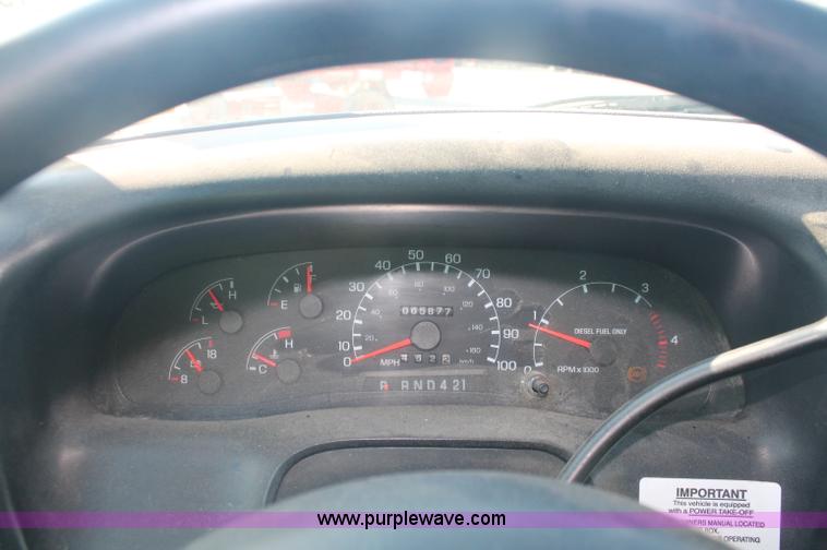 image for item C2911 2007 Ford F650 flatbed rollback truck