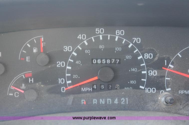 image for item C2911 2007 Ford F650 flatbed rollback truck