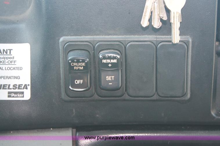 image for item C2911 2007 Ford F650 flatbed rollback truck