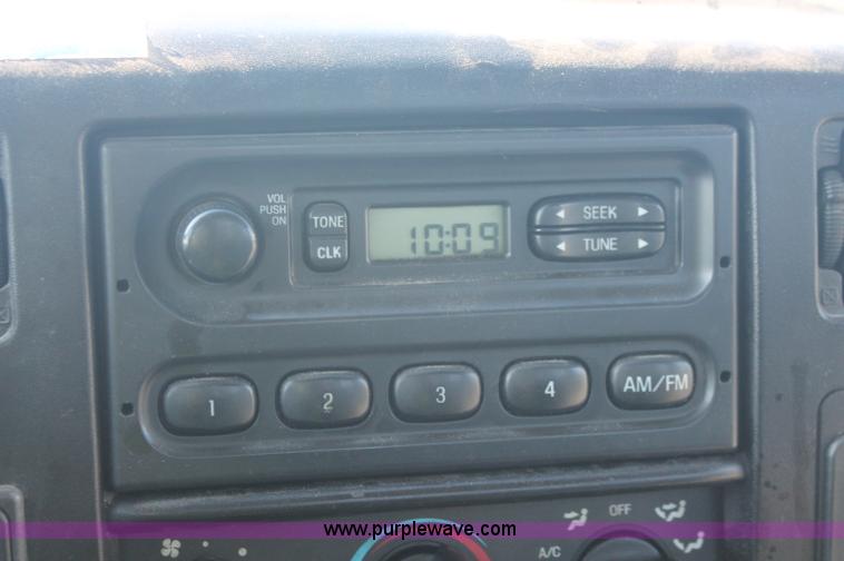 image for item C2911 2007 Ford F650 flatbed rollback truck