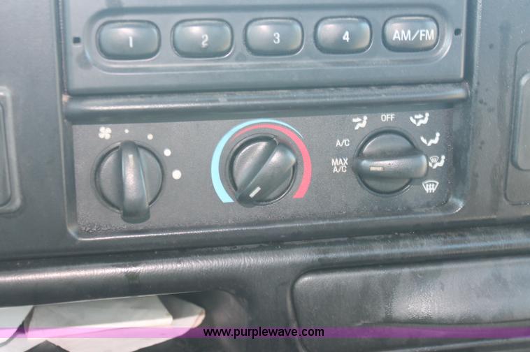 image for item C2911 2007 Ford F650 flatbed rollback truck