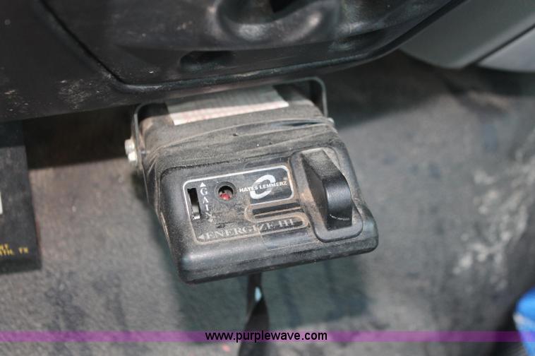 image for item C2911 2007 Ford F650 flatbed rollback truck