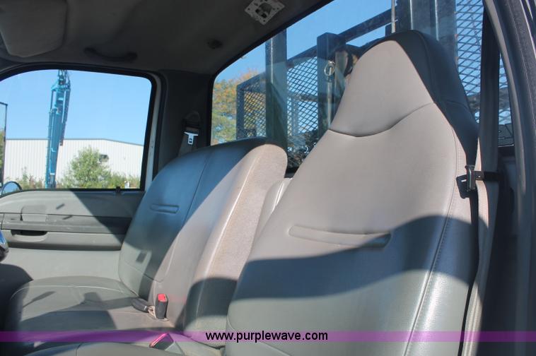 image for item C2911 2007 Ford F650 flatbed rollback truck
