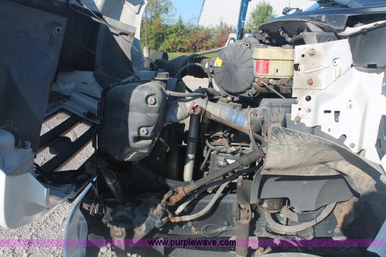 image for item C2911 2007 Ford F650 flatbed rollback truck