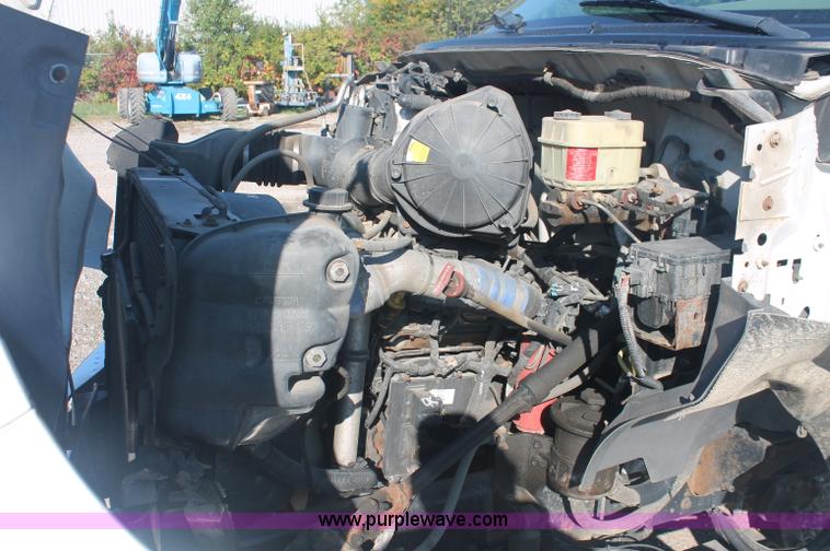 image for item C2911 2007 Ford F650 flatbed rollback truck