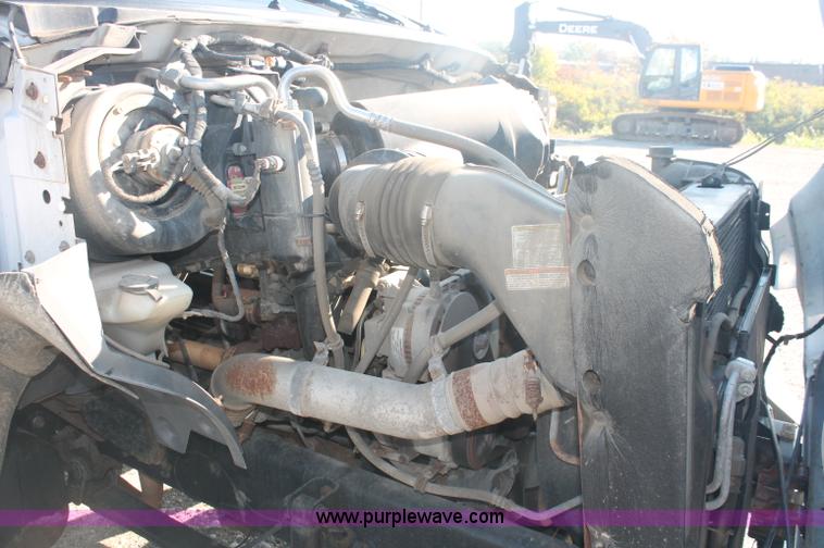 image for item C2911 2007 Ford F650 flatbed rollback truck