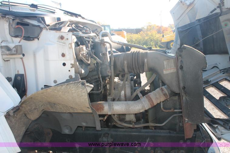 image for item C2911 2007 Ford F650 flatbed rollback truck