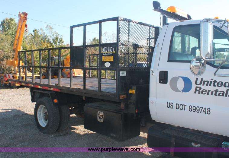 image for item C2911 2007 Ford F650 flatbed rollback truck