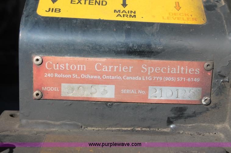 image for item C2911 2007 Ford F650 flatbed rollback truck