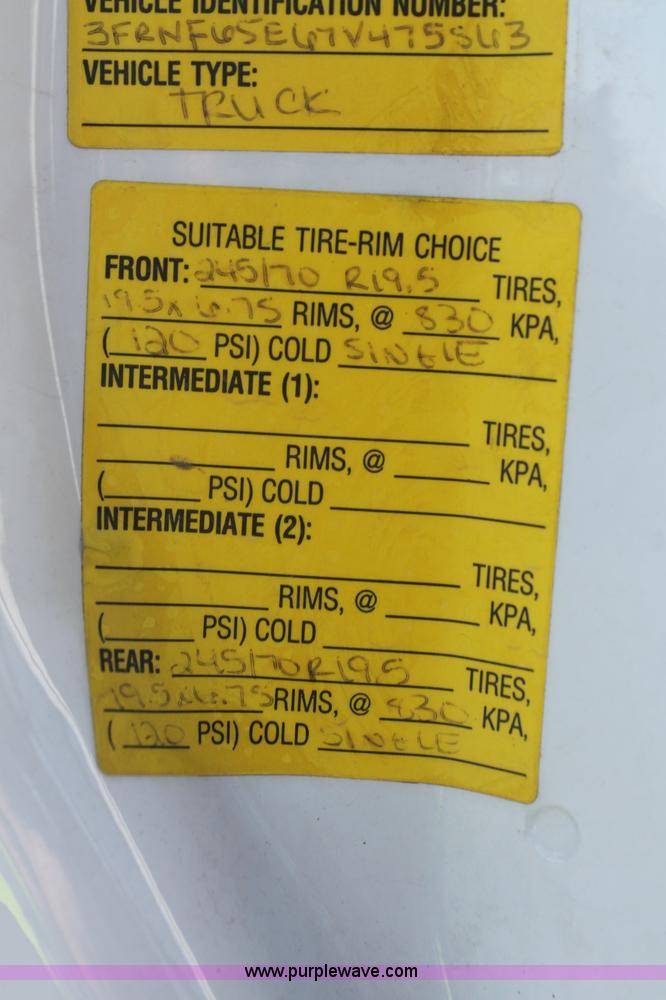 image for item C2911 2007 Ford F650 flatbed rollback truck