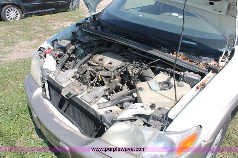 image for item O9339 1999 Pontiac Montana mini van