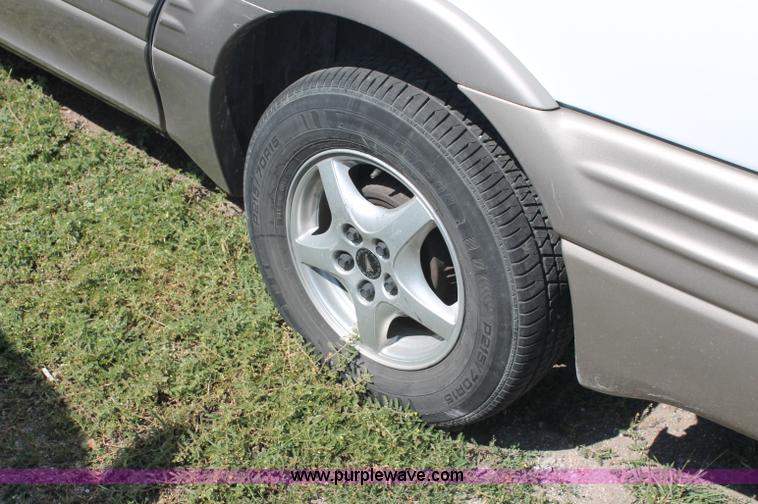 image for item O9339 1999 Pontiac Montana mini van