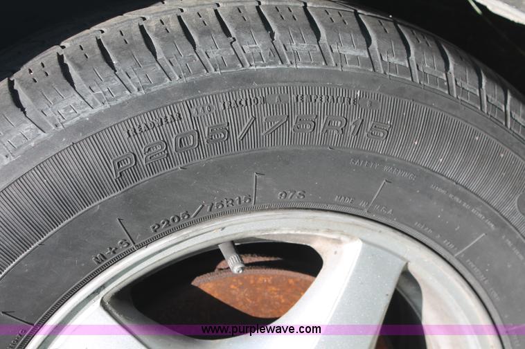 image for item O9339 1999 Pontiac Montana mini van