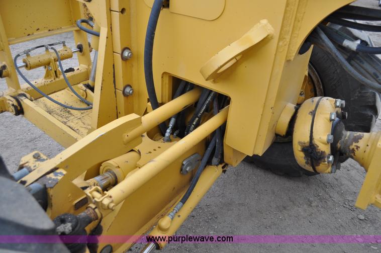 image for item C3027 2004 John Deere 772CH II motor grader